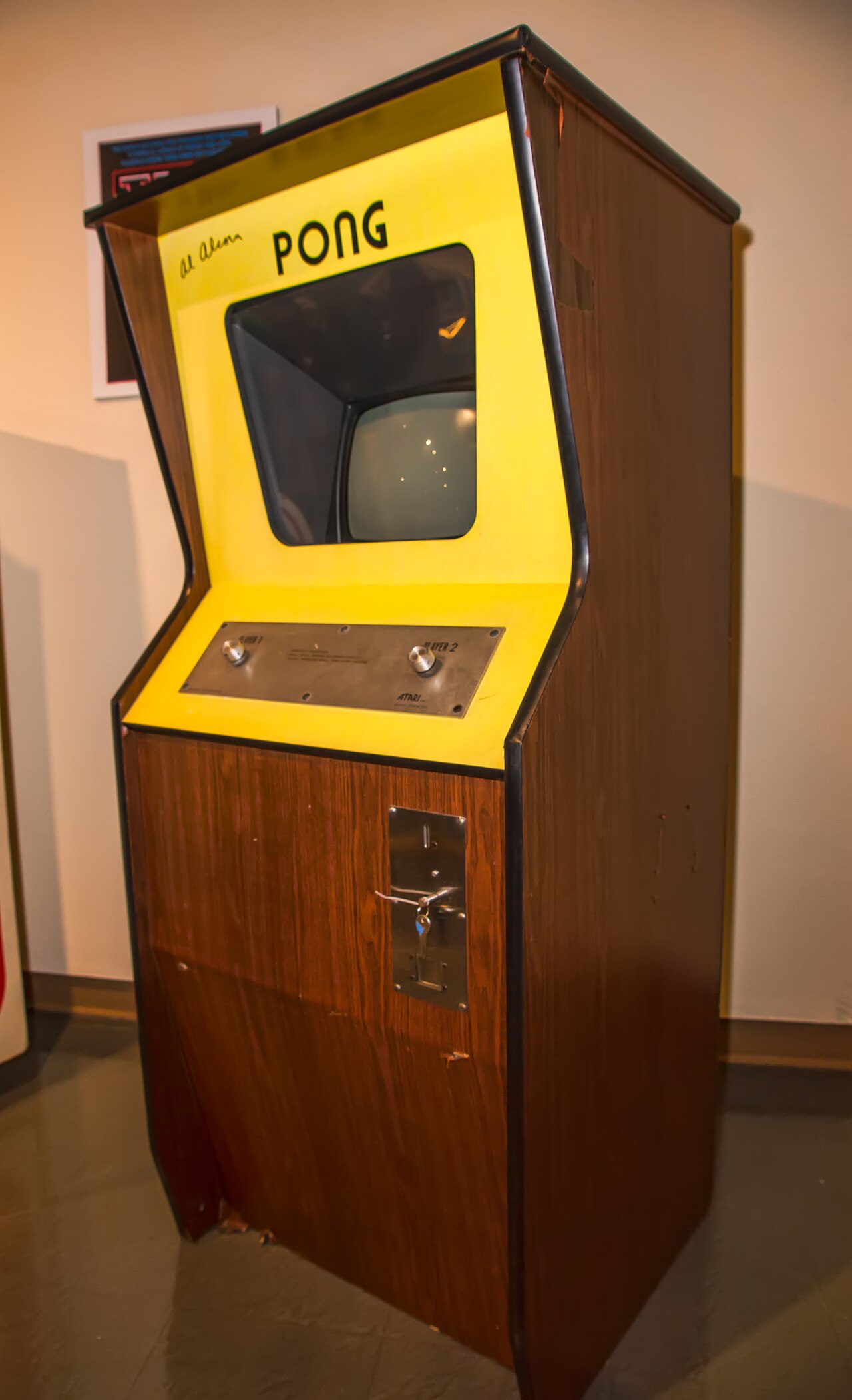 Example 2. A Pong cabinet signed by Al Alcorn.