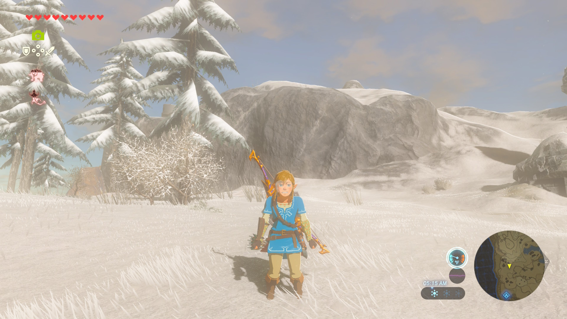 Link shivers and loses health in the freezing conditions of Mount Hylia in Breath of the Wild.